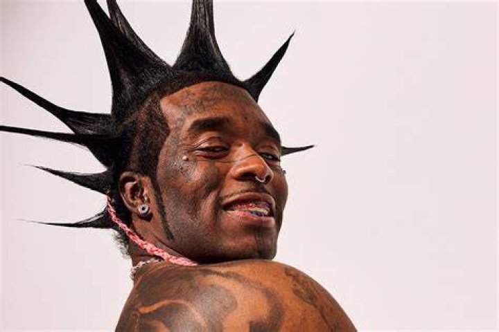 
JT Defends “Black Rockstar” Lil Uzi Vert After Photo Of His Pierced Belly Button Trends, Says “Yes H*e That’s MY Man” 