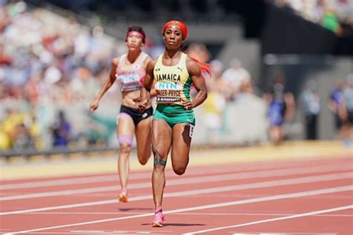 Why Is Shelly-Ann Fraser-Pryce Wearing A Wig? Fixes It During The Mid-Race